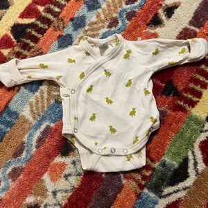 Newborn Kate Quinn bodysuit